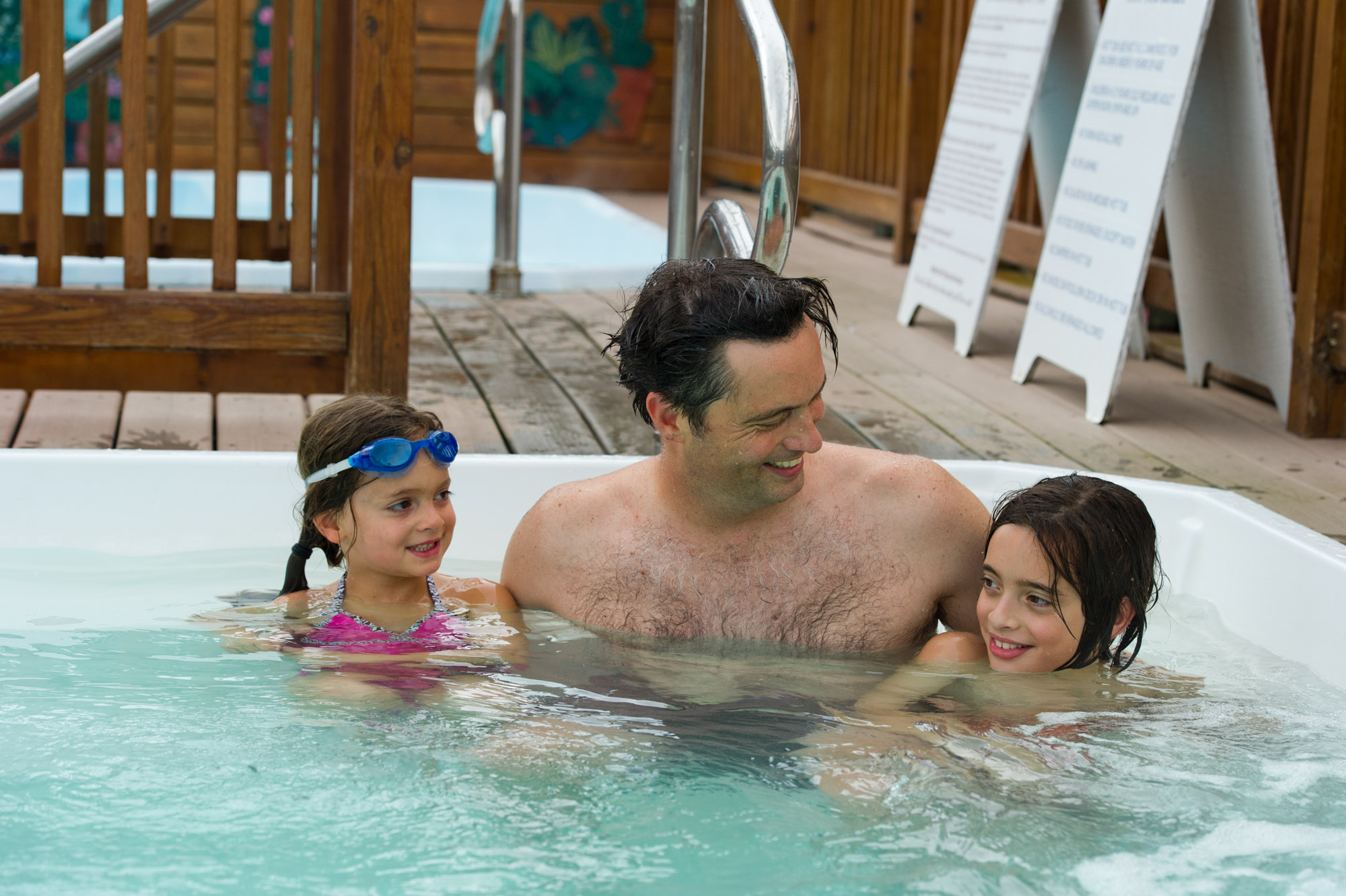 Family in Hot Tub at Courtside Pool