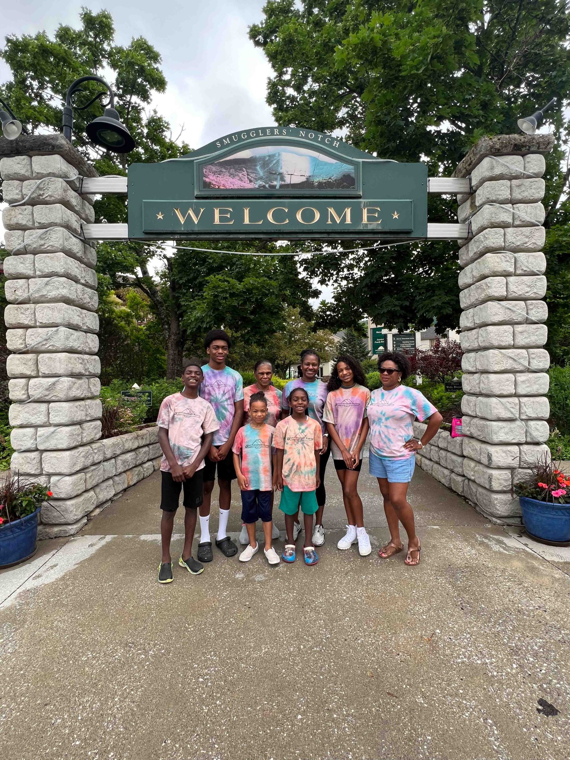 Family Photo by the Welcome Sign